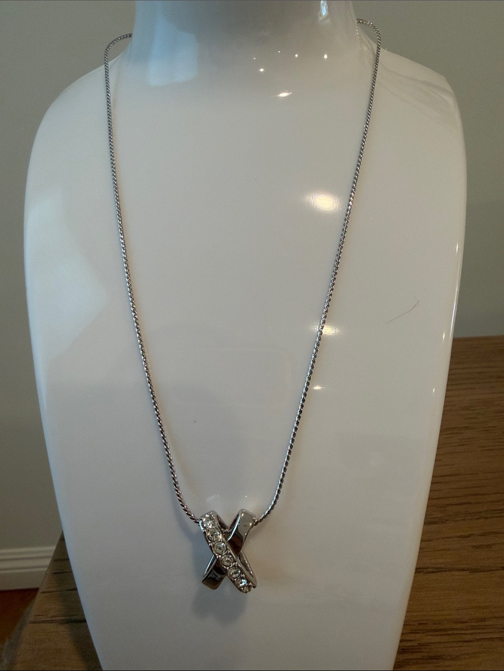 Nina Ricci Silver-tone X Pendant Necklace with Crystal Accents